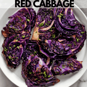Roasted cabbage slices arranged on a plate.
