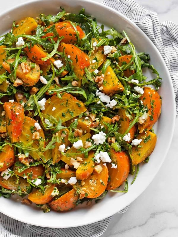 Roasted golden beet salad on a plate.