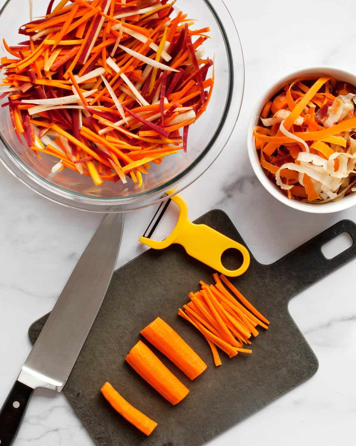 How to cut carrots into matchsticks using a peeler and a chef's knife.