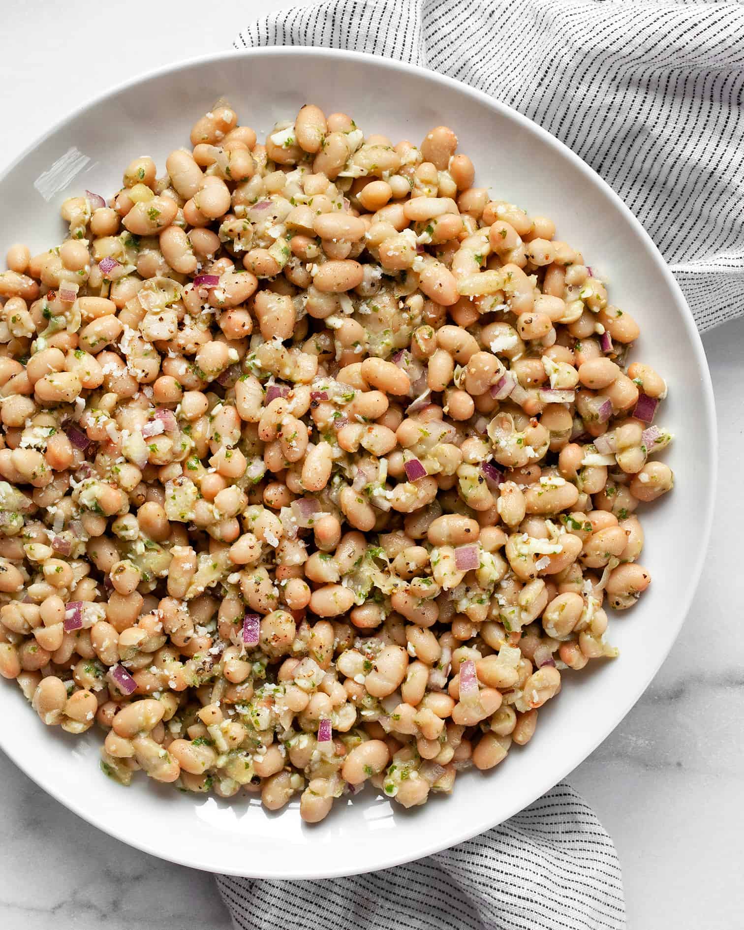 White bean salad on a plate.