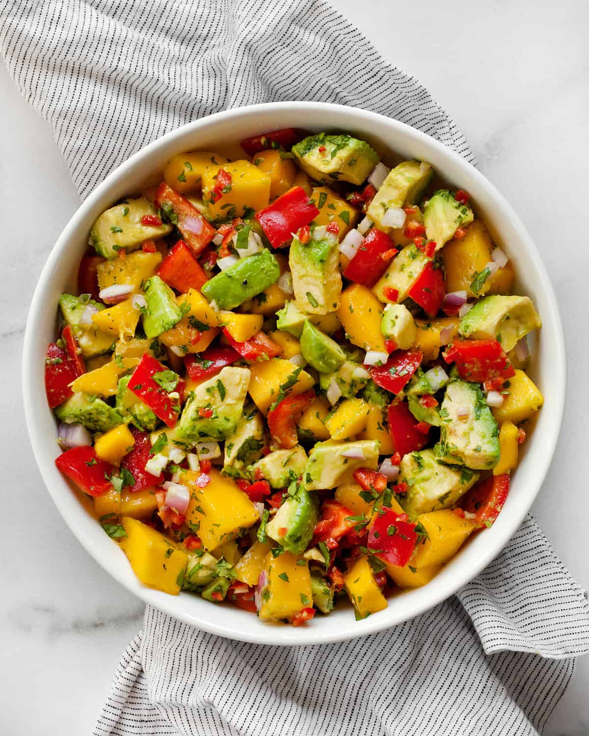 Mango avocado salad in a bowl.