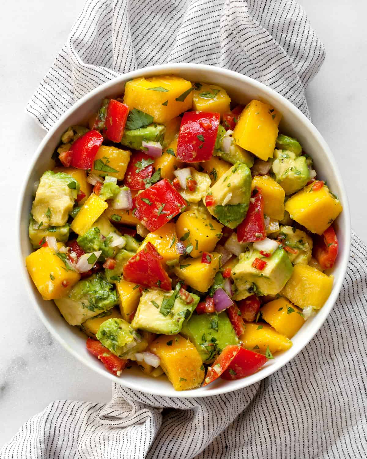 Mango avocado salad in a bowl.