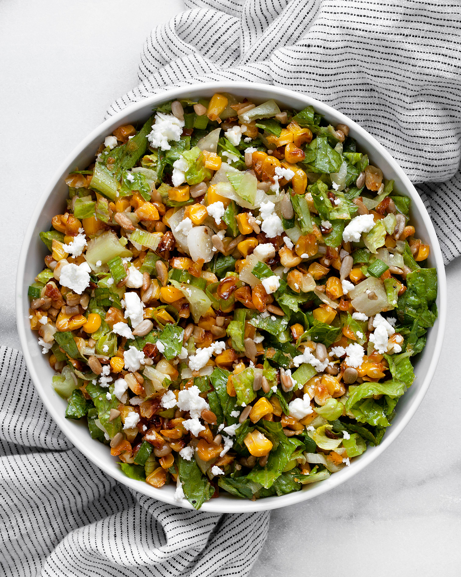 Roasted corn salad in a bowl.