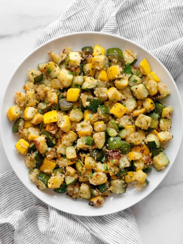 Roasted zucchini and squash on a plate.