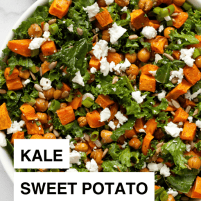 Kale salad with roasted sweet potatoes and chickpeas on a plate.