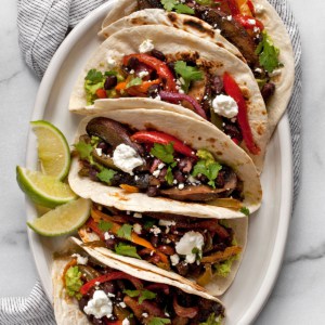 Veggie fajitas on a plate.