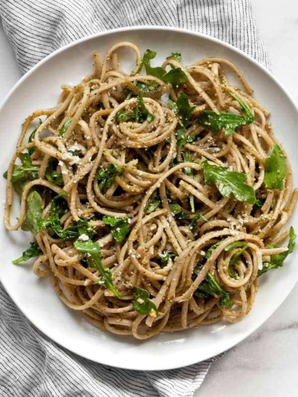 Arugula pasta on a plate.