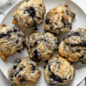 Lemon blueberry scones on a plate.