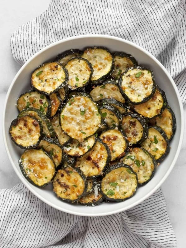 Parmesan roasted zucchini in a bowl.