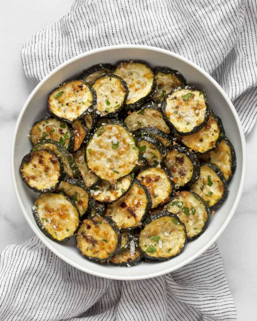 Parmesan roasted zucchini in a bowl.