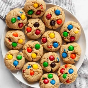 Peanut butter m&m cookies on a plate.