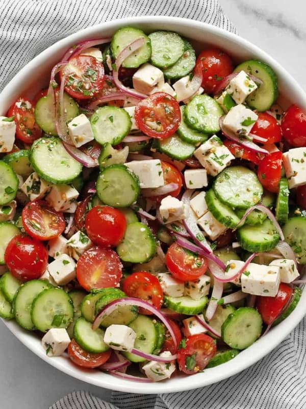 Cucumber tomato feta salad in a bowl.