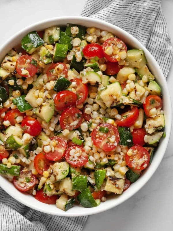 Zucchini corn salad in a bowl.