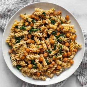 Chickpea spinach pasta on a plate.