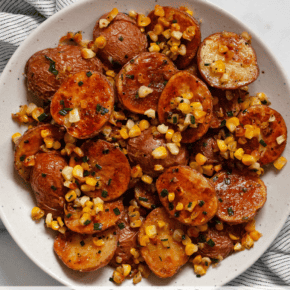 Roasted potato corn salad in a bowl.