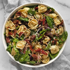 Tortellini pasta salad in a bowl.