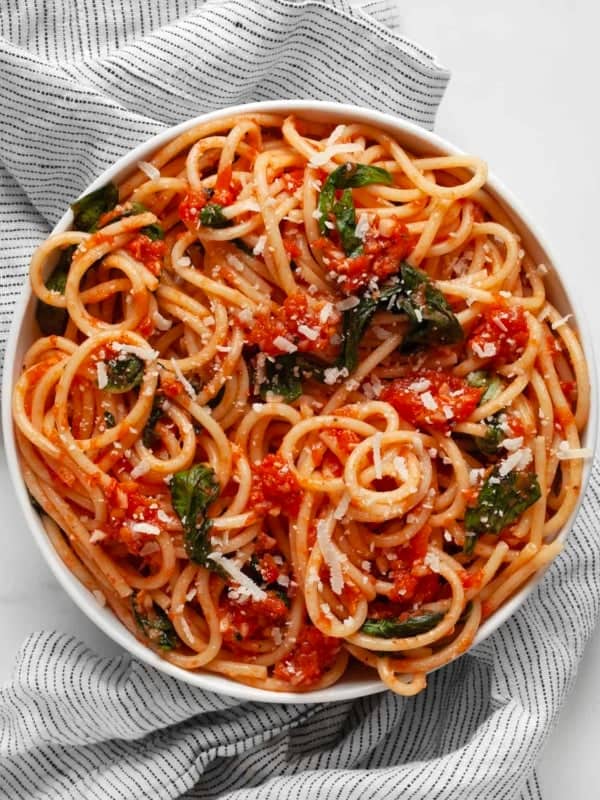 Tomato basil pasta in a small bowl.