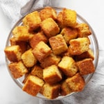 Cornbread croutons in a bowl.