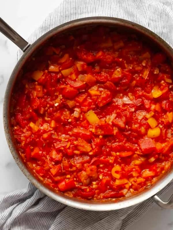 Stewed tomatoes in a pan.