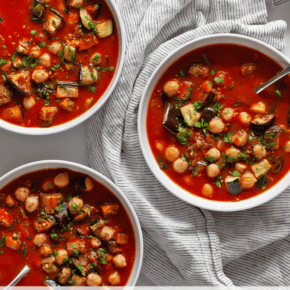 Three bowls of vegetable stew.