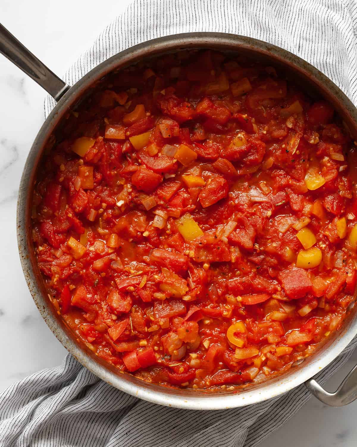 Stewed tomatoes in a pan.