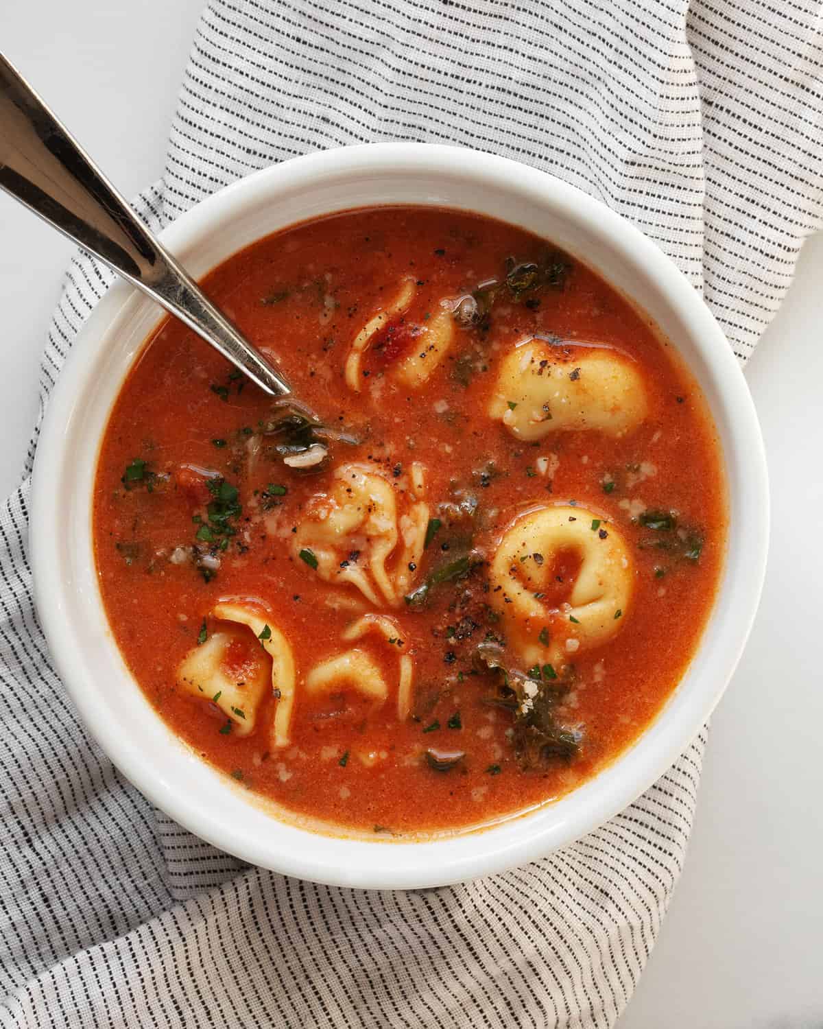 One bowl of creamy tortellini soup.