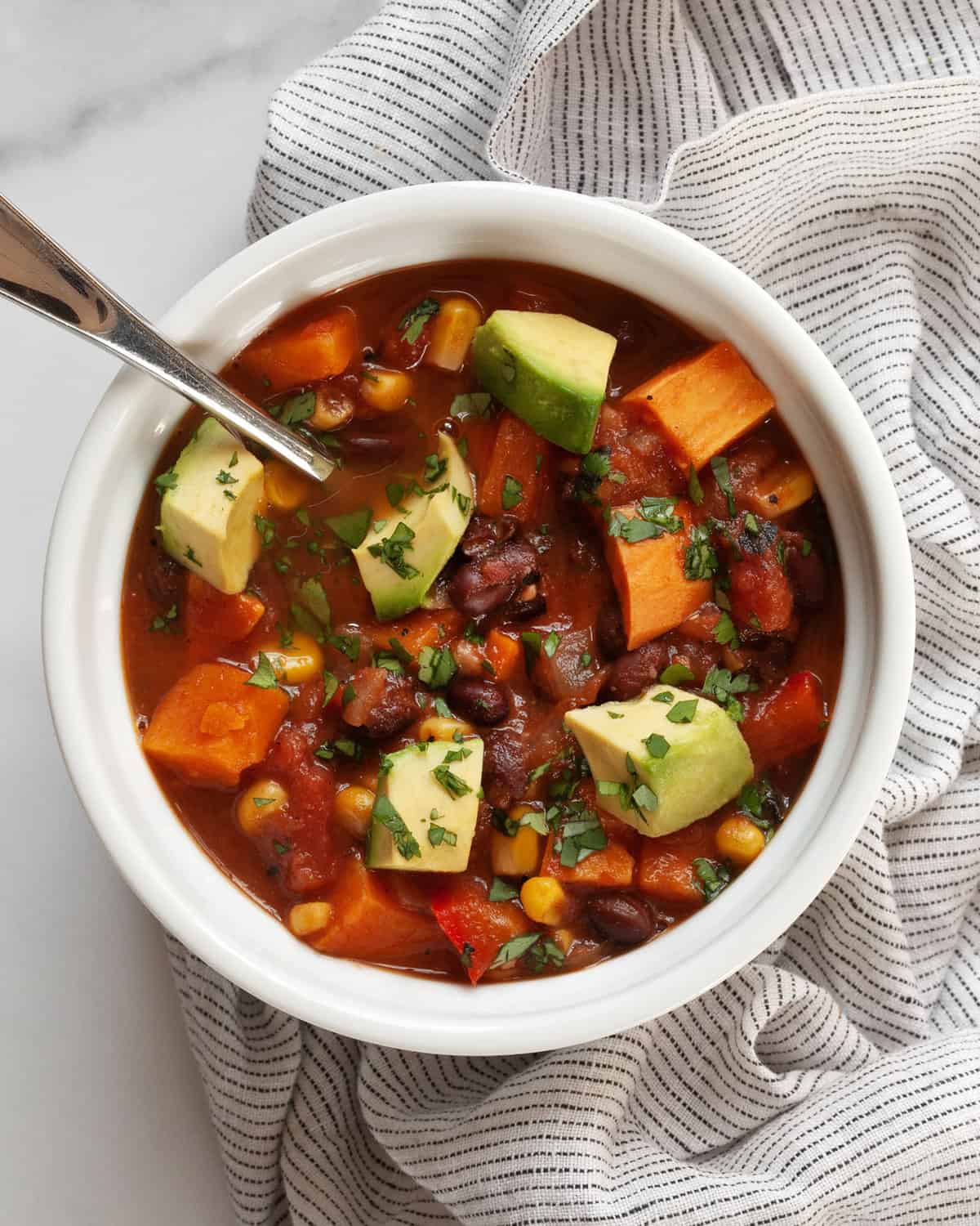 Sweet potato black bean chili in a bowl.