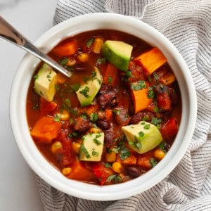 Bowl of vegan chili with sweet potatoes.