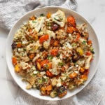 Roasted vegetable salad with sweet potatoes, cauliflower and sweet potatoes on a plate.