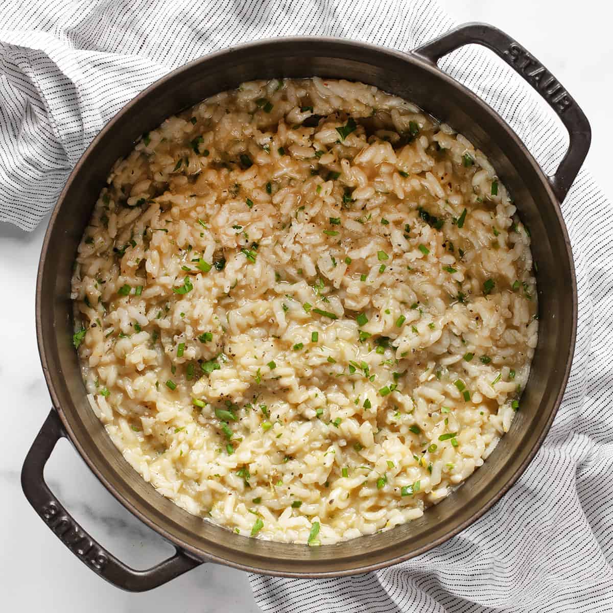 Lemon risotto in a dutch oven.