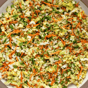 Napa cabbage salad on a large platter.