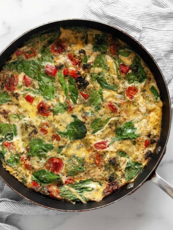 Easy egg white frittata with roasted tomatoes, peppers and broccoli.