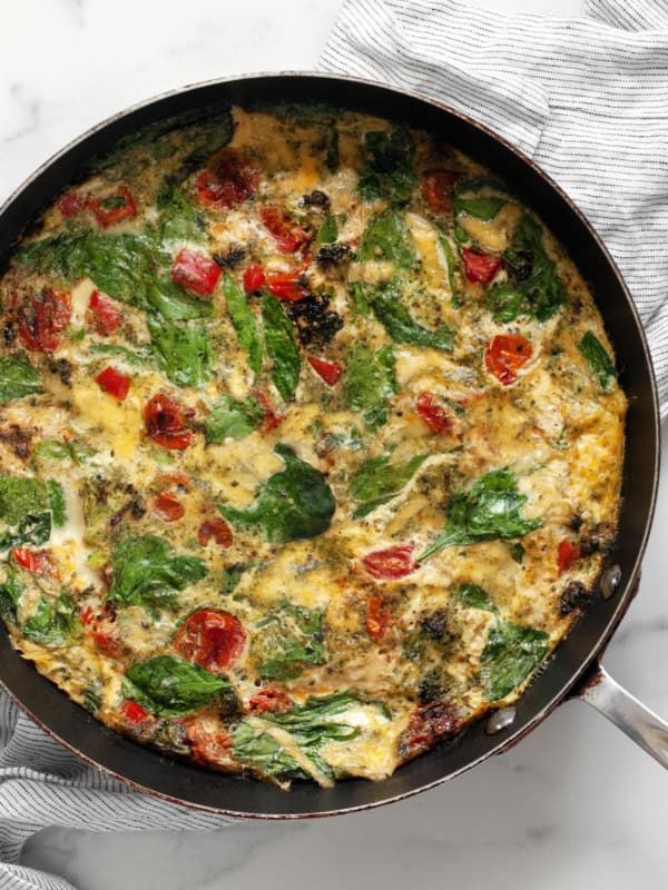 Easy egg white frittata with roasted tomatoes, peppers and broccoli.