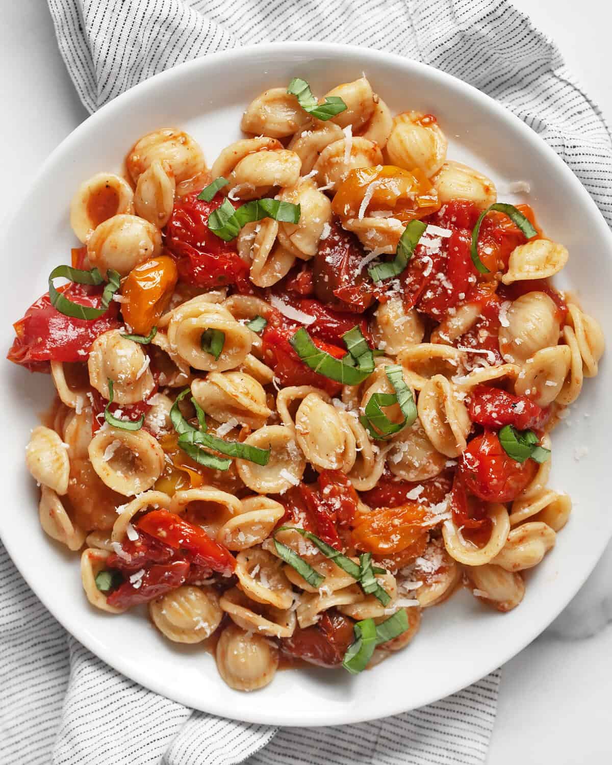 Roasted tomato pasta on a plate.