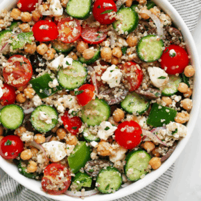 Greek quinoa salad in a bowl.