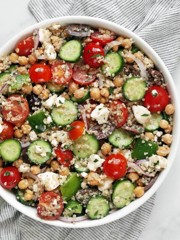 Greek quinoa salad in a bowl.