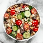 Greek quinoa salad in a bowl.