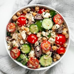 Greek quinoa salad in a bowl.