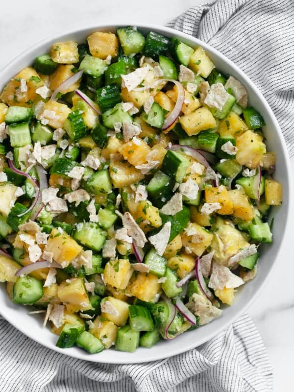 Pineapple cucumber salad in a bowl.