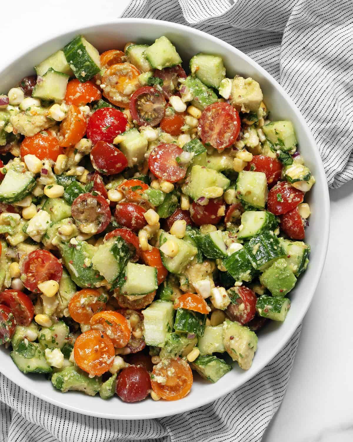 Avocado tomato salad in a bowl.