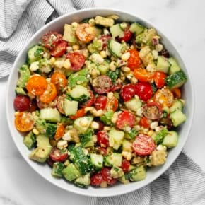 Avocado tomato salad in a bowl.