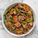 Roasted potato and green bean salad in a bowl.