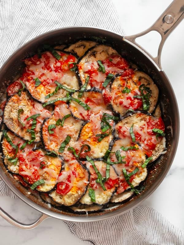 Eggplant casserole in a skillet.