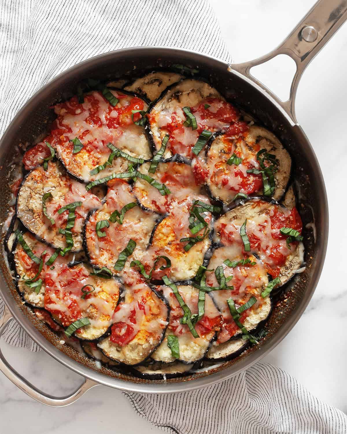 Eggplant casserole in a skillet.