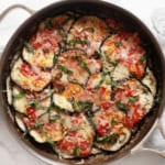 Eggplant casserole in a skillet.