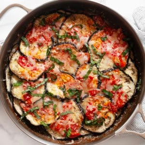 Eggplant casserole in a skillet.