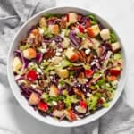 Apple pecan salad in a bowl.