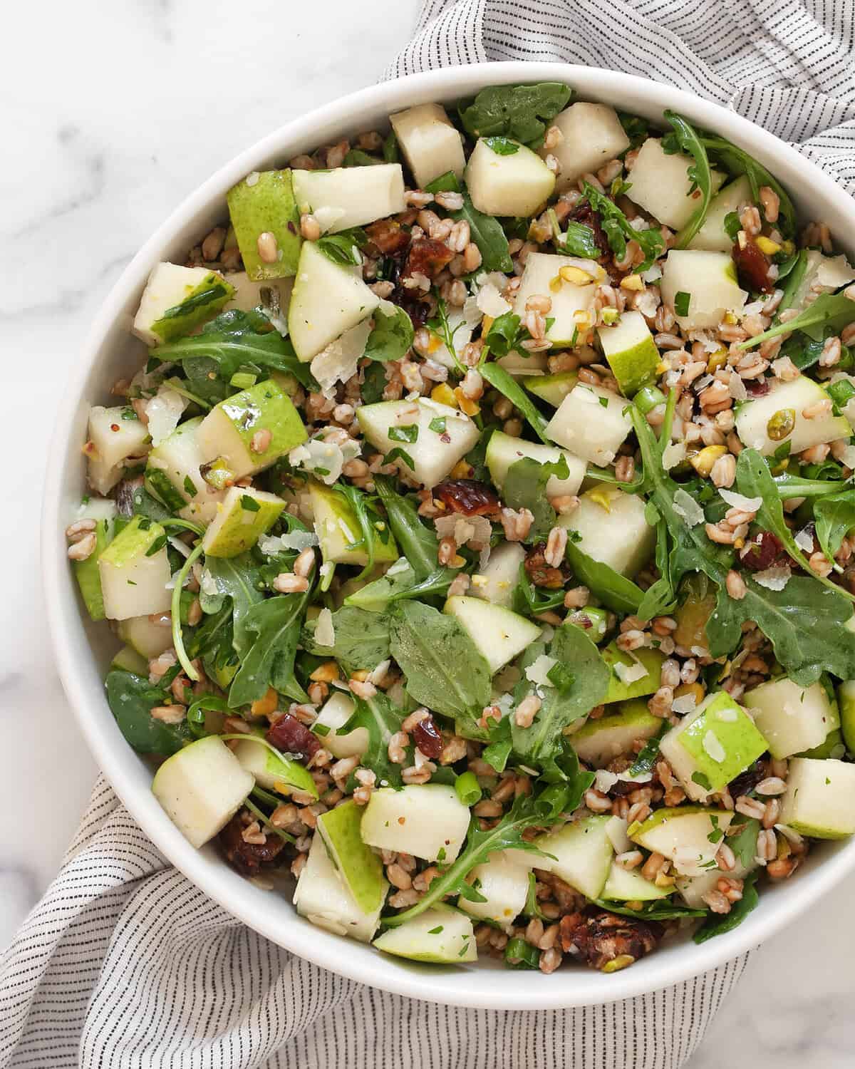 Pear farro salad in a bowl.