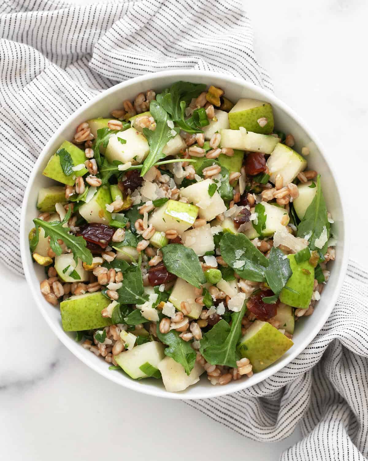 Pear farro salad in a bowl.