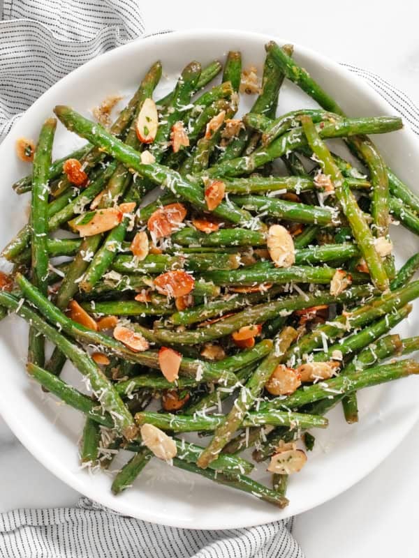 Roasted garlic parmesan green beans on a plate.